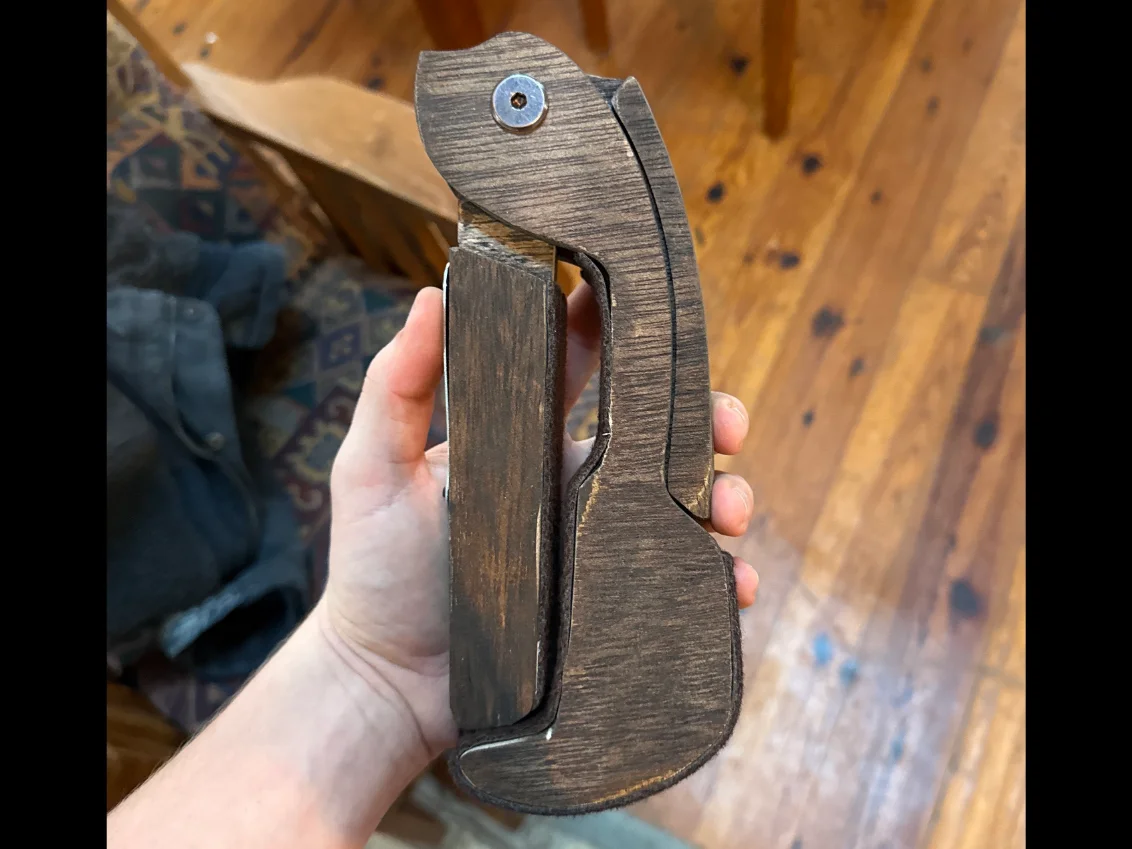 A stand part hand-finished in dark walnut oil stain
