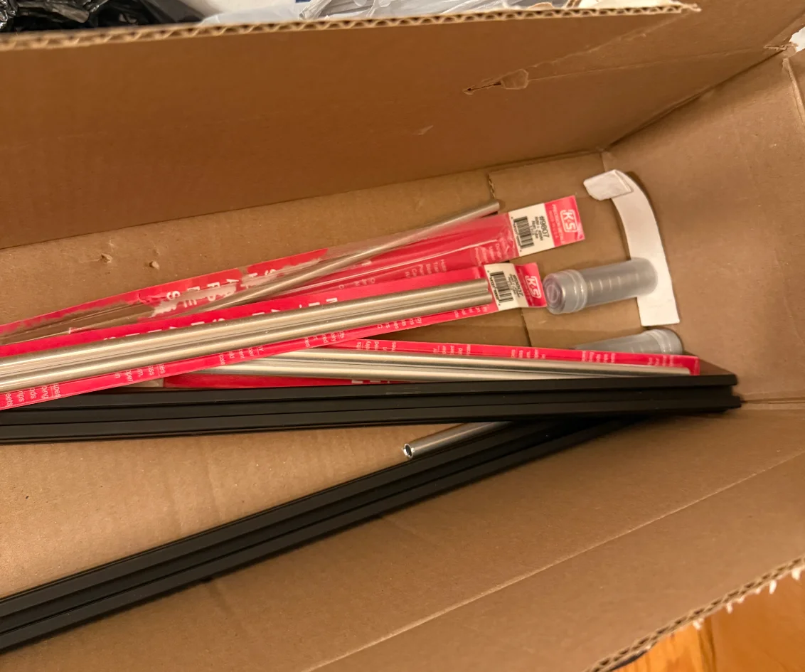 The salvaged aluminum extrusion and shafts the press was built from