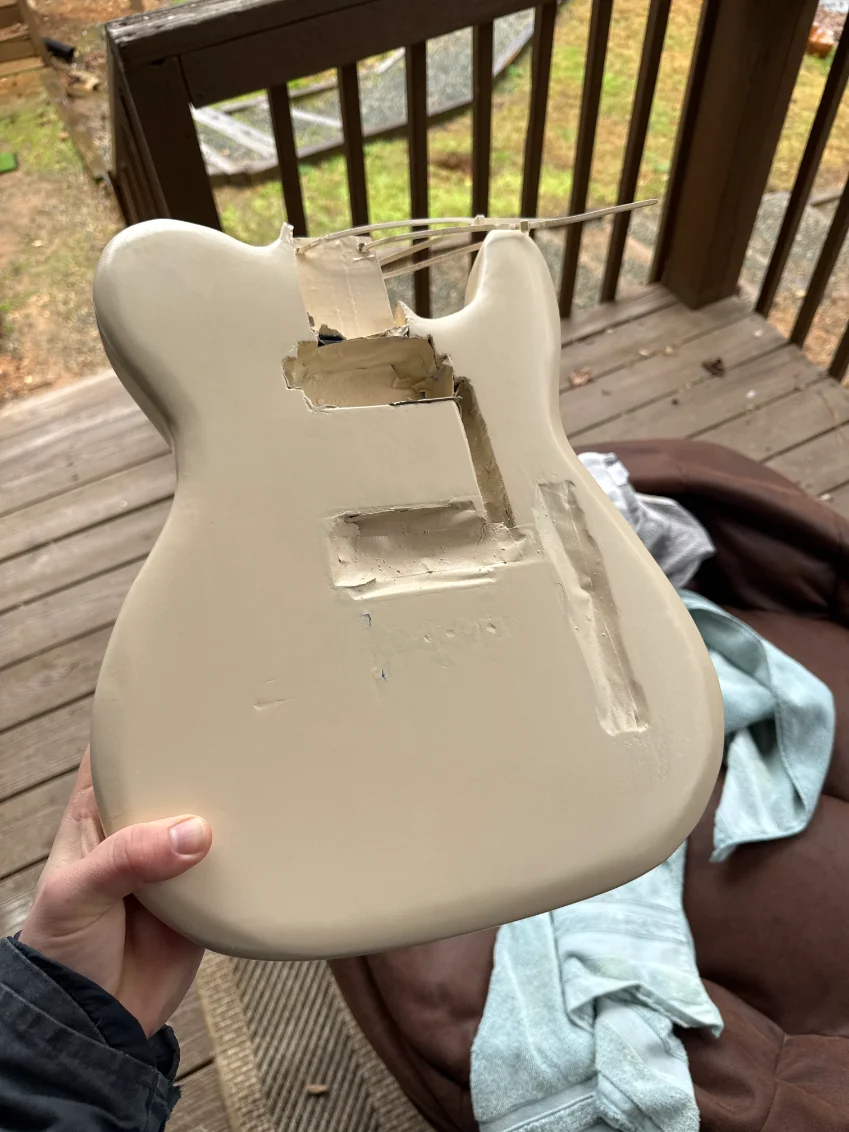 The body after wet-sanding the off-white enamel finish